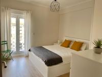 A bed or beds in a room at Xuloss Apartments 2