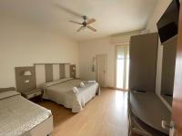 Łóżko lub łóżka w pokoju w obiekcie Hotel Vera