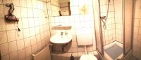 a small bathroom with a toilet and a sink at Hotel Hohenstein -Radweg-Messe-Baldeneysee in Essen