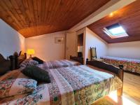 Łóżko lub łóżka w pokoju w obiekcie House Letizia 2147