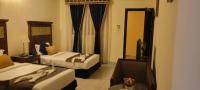 Ras Dika Hotelにあるベッド