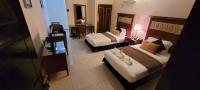 Ras Dika Hotelにあるベッド