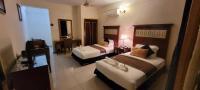 Ras Dika Hotelにあるベッド