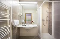 Ein Badezimmer in der Unterkunft Remisens Hotel LUCIJA
