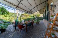 Vonkajšia záhrada v ubytovaní Villa Dossetti