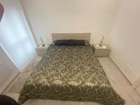 A bed or beds in a room at Torino Reale