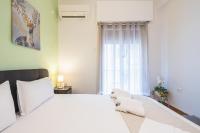 Posteľ alebo postele v izbe v ubytovaní Erythros Boutique Suite By Cloudkeys