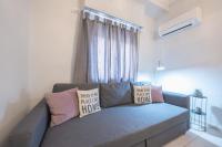Posteľ alebo postele v izbe v ubytovaní Erythros Boutique Suite By Cloudkeys