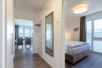 Postel nebo postele na pokoji v ubytování Aparthotel Ostseeallee Aparthotel Ostseeallee 2-15