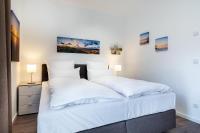 Postel nebo postele na pokoji v ubytování Aparthotel Ostseeallee Aparthotel Ostseeallee 4-33