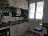 A cozinha ou cozinha compacta de Logement entier - Appartement T4 hypercentre dans une rue calme - Stationnement gratuit