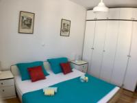 Postel nebo postele na pokoji v ubytování Apartment Popeye