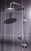a shower with a shower head in a bathroom at TOP Apartman in Šabac