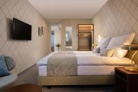 Posteľ alebo postele v izbe v ubytovaní Xerion Hotel