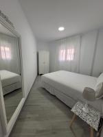 Posteľ alebo postele v izbe v ubytovaní Apartamentos “Mar de Coral” Aguadulce