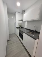 Kuchyňa alebo kuchynka v ubytovaní Apartamentos “Mar de Coral” Aguadulce
