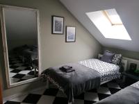 Postel nebo postele na pokoji v ubytování Apartmani Sunset