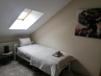 Postel nebo postele na pokoji v ubytování Apartmani Sunset