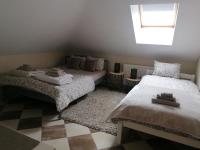Postel nebo postele na pokoji v ubytování Apartmani Sunset