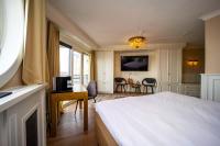 Een TV en/of entertainmentcenter bij Fletcher Hotel-Restaurant Arion-Vlissingen
