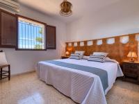Postel nebo postele na pokoji v ubytování Holiday Home Masirope by Interhome