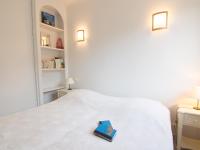 Una cama o camas en una habitaci&oacute;n de Apartment Riva Bella-3 by Interhome