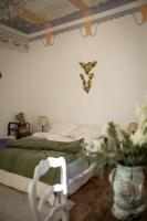 Una cama o camas en una habitaci&oacute;n de Maison d&#39;artistes - Pavillon Southway