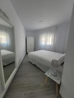 Posteľ alebo postele v izbe v ubytovaní Apartamentos “Mar de Coral” Aguadulce