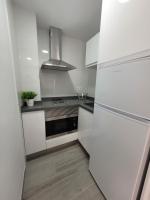 Kuchyňa alebo kuchynka v ubytovaní Apartamentos “Mar de Coral” Aguadulce