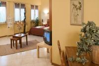 A seating area at Argentiere Room Apartments