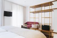 Telewizja i/lub zestaw kina domowego w obiekcie The Passage Apartments