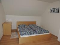Posteľ alebo postele v izbe v ubytovaní Apartmánový Dom River