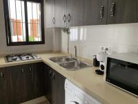 Kuchyň nebo kuchyňský kout v ubytování Urb Las Cañas Apartamento B3