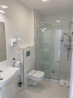 Kúpeľňa v ubytovaní Carina Hotel