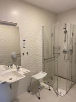 Kúpeľňa v ubytovaní Carina Hotel