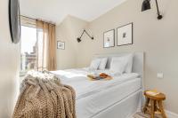 Posteľ alebo postele v izbe v ubytovaní Live & Travel Old Town Apartments
