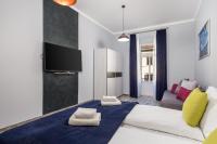 Posteľ alebo postele v izbe v ubytovaní Apartments Piccola Venezia