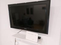 TV a/nebo společenská místnost v ubytování Apartmani Dejan