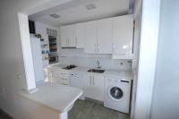Kuchyňa alebo kuchynka v ubytovaní Atico Apartamento Loft Playa Victoria Cadiz