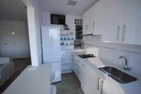 Kuchyňa alebo kuchynka v ubytovaní Atico Apartamento Loft Playa Victoria Cadiz