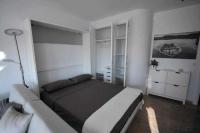 Posteľ alebo postele v izbe v ubytovaní Atico Apartamento Loft Playa Victoria Cadiz