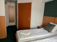 Posteľ alebo postele v izbe v ubytovaní Garbarska 22 Aparthotel