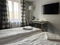 Posteľ alebo postele v izbe v ubytovaní Garbarska 22 Aparthotel