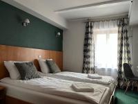 Posteľ alebo postele v izbe v ubytovaní Garbarska 22 Aparthotel