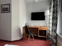 Televízia a/alebo spoločenská miestnosť v ubytovaní Garbarska 22 Aparthotel