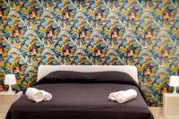 A bed or beds in a room at LOGICO 56