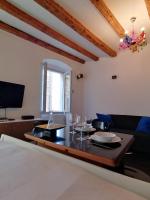 Televízia a/alebo spoločenská miestnosť v ubytovaní Glamour apartment sea view