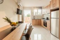 Kuchyň nebo kuchyňský kout v ubytování Kelly's Sunset Apartment 1 Κalamata