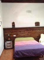 A bed or beds in a room at Cortijo Los Flamencos