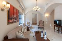 Telewizja i/lub zestaw kina domowego w obiekcie Ionia Suites
